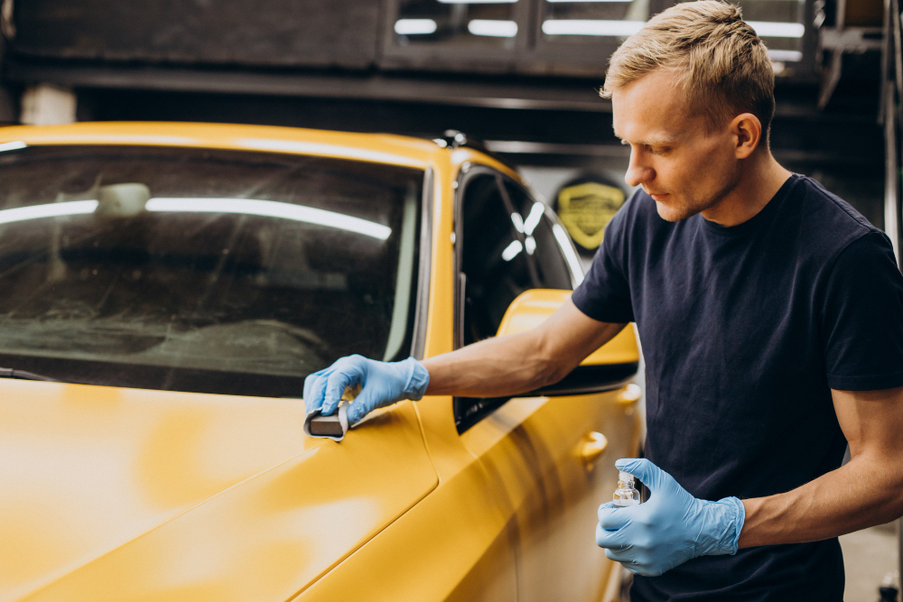 man-car-service-doing-car-ceramic-procedure.jpg